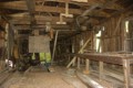 The interior of the Ritchie Sawmill, showing former bed of the saw carriage, left, and preseumed cut-off saw tables right; on Noonan Road, Bathurst Ward, Tay Valley Township. 2005